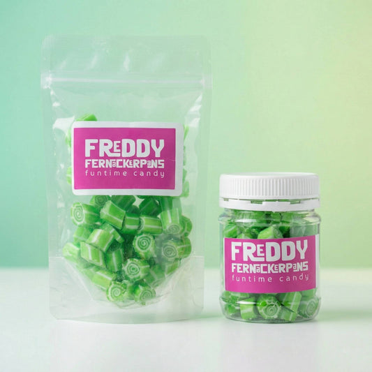 Green candy package and jar with 'Freddy Fernckerpans' label on a light green background